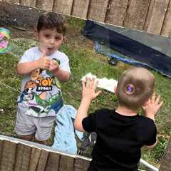 Toddler Pals Living Next Door Can Finally Play Together Again After Crafty Mom Installs Fence Window